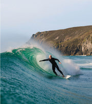 Tom Kay surfing wave