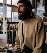 Nick sitting at a table